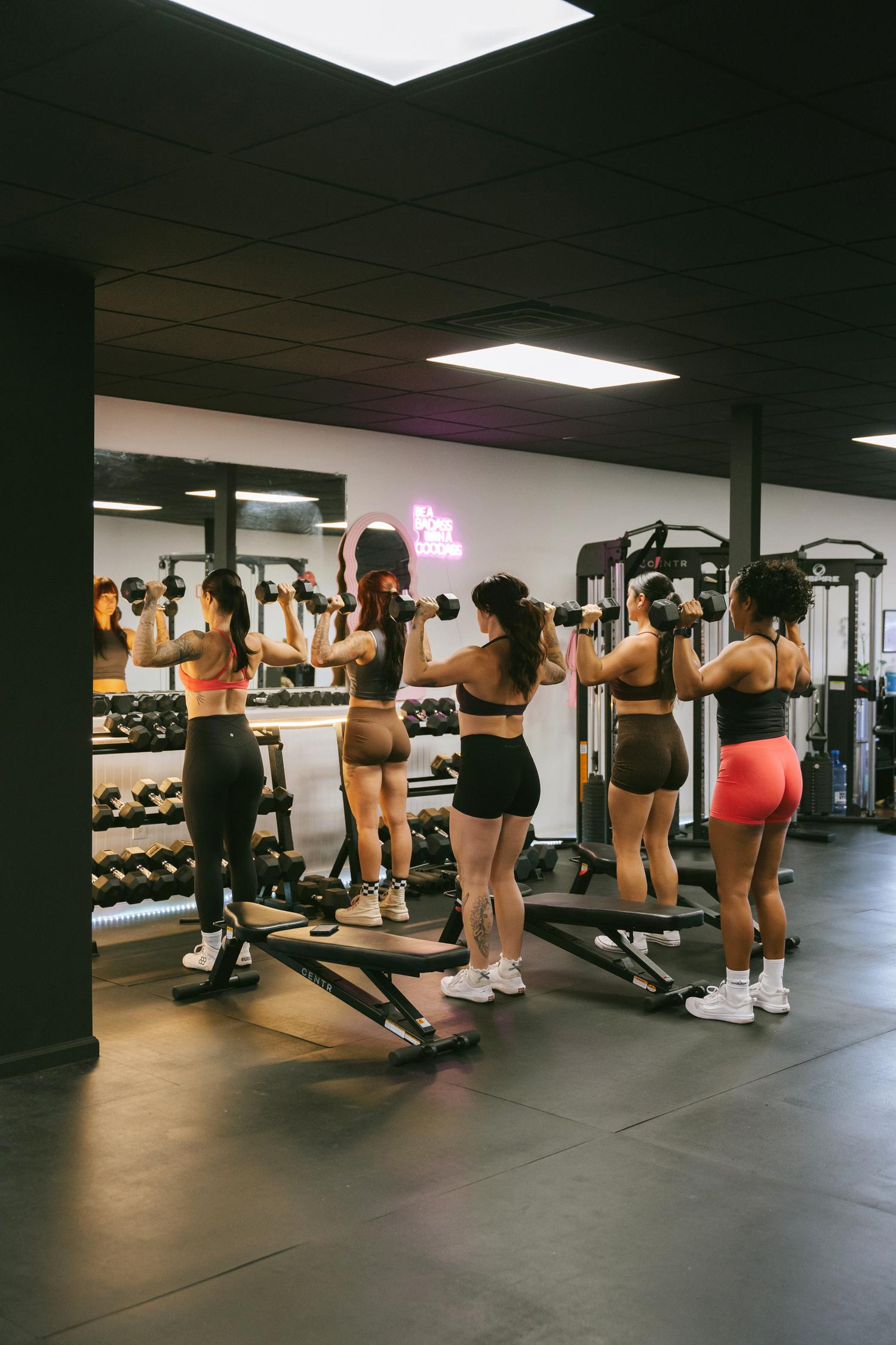 Upper body dumbbell press class at Lift Studio Maui